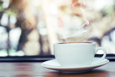 cup of coffee in cafee in dark tone and vintageの写真素材