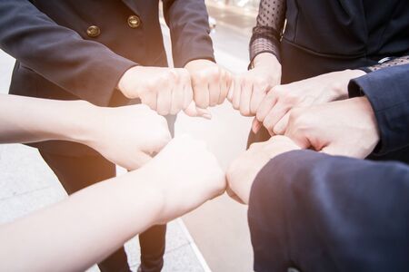 Join forces and succesful team concept, businessman joining hand together