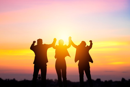 Team work and succes concept, silhouette business people corporate and winの写真素材