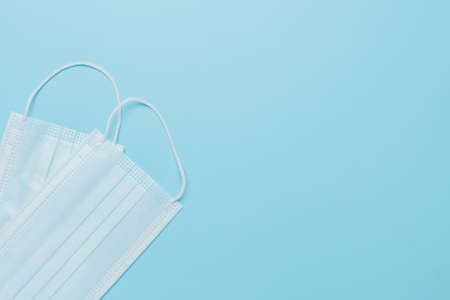 face mask for protect coronavirus on soft blue background