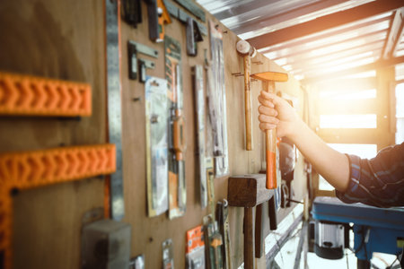 close up hand of woman packing box to move new home