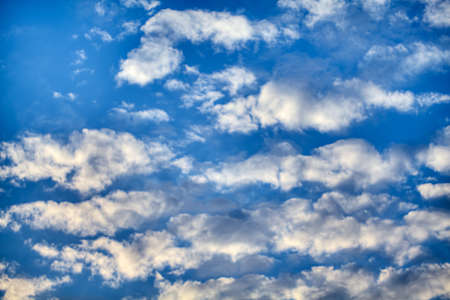 Blue sky with clouds, background