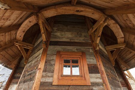 Detail of the roof and wall on wooden building