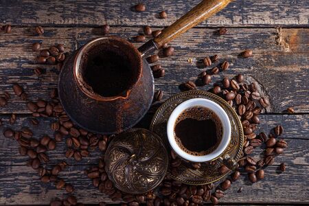 Hot cofee on wood backgroundの写真素材