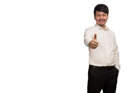 Asian businessman wear white shirt pointing finger by two hands, smiling and feeling happy, isolate on white backgroundの写真素材