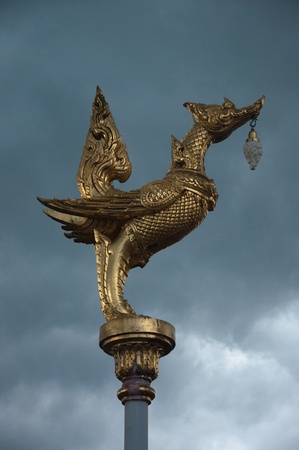Thai Style Garuda Light lamp with sky backgroundの写真素材
