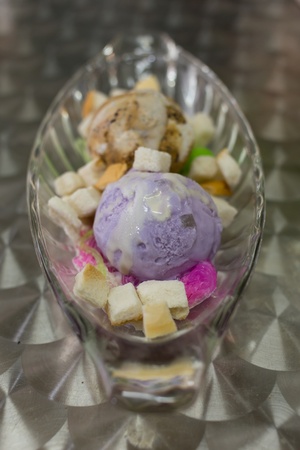 taro and capuccino icecream with bread on dishの写真素材