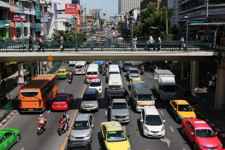 Bangkok, Thailand - September 2, 2016: Flyover footbridge avoid traffic jam in bangkok. The city of...
