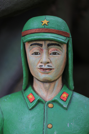 Trang, Thailand - September 5, 2016: Closeup face of Japanese Soldier statue at Japan army underground tunnel entrancement in world war 2 (1939-1945) at Kantang in Trang Thailandのeditorial素材