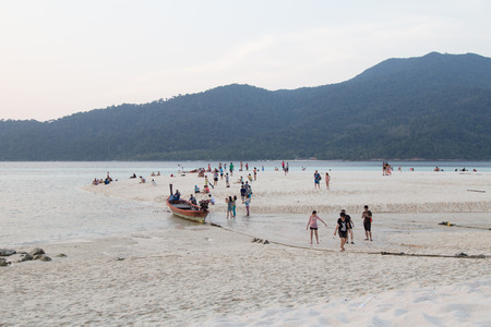 Satun, Thailand - March 6, 2015: Many tourists on the beach at Lipe island Paradise of Andaman sea. Many tourists come visit beautiful beach all year.のeditorial素材
