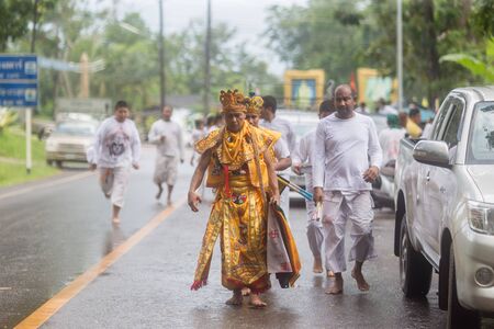 Trang, Thailand - October 15, 2018: Chinese god Monkey King spiritual medium walking during vegetable festival in Trang, Thailand.のeditorial素材