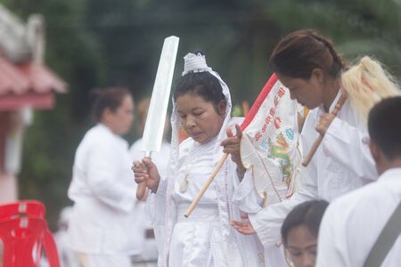 Trang, Thailand - October 15, 2018: Chinese god of Mercy Guan yin spiritual medium at 108 shrine in Pali district during vegetable festival in Trang, Thailand.のeditorial素材