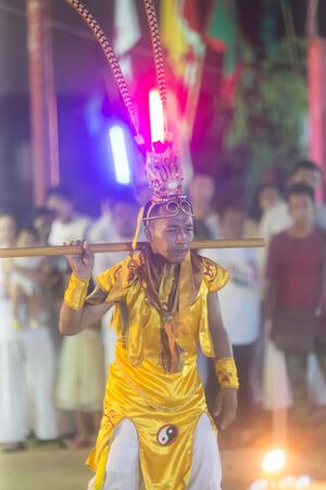 Trang, Thailand - October 14, 2018: Chinese God Monkey King spiritual medium at Tai-Sia-Hood-jow Trang shrine during vegetarian festival.のeditorial素材