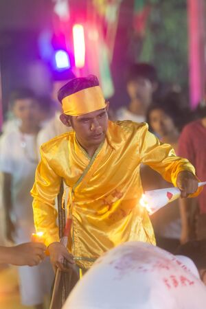 Trang, Thailand - October 14, 2018: Chinese God Monkey King spiritual medium pray for god at Tai-Sia-Hood-jow Trang shrine during vegetarian festival.のeditorial素材