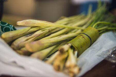 fresh green Scallion in the kitchen ready for cooking. fresh green onion tree leaves, Scallion. Green onion vegetables for various type of cooking.の写真素材