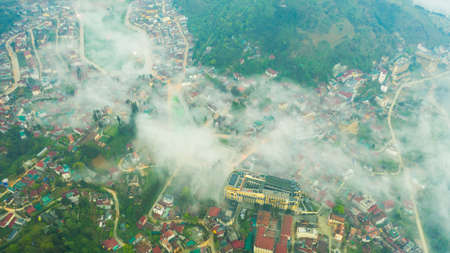 Aerial view of panorama landscape at the hill town in Sapa city, Lao Cai Province, Vietnam in Asia with the sunny light and sunset, mountain view in the cloudsの写真素材