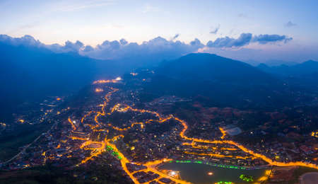 Aerial view of panorama landscape at the hill town in Sapa city, Lao Cai Province, Vietnam in Asia with the sunny light and sunset, mountain view in the cloudsの写真素材
