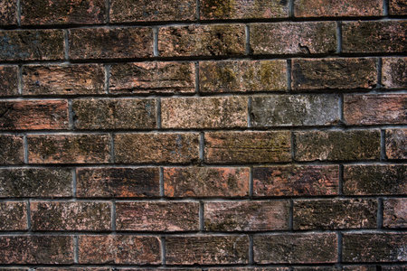 Close up vintage red and brown brick wall background. Grunge background. Bric. Rustic style.の写真素材