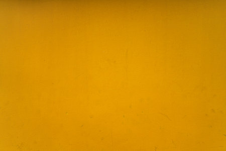 Abstract yellow cement wall texture and background. Modern grafitty wallpaper. A wall have some grunge effects and lines. Background and texture concept.の写真素材