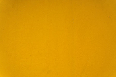 Abstract yellow cement wall texture and background. Modern grafitty wallpaper. A wall have some grunge effects and lines. Background and texture concept.の写真素材