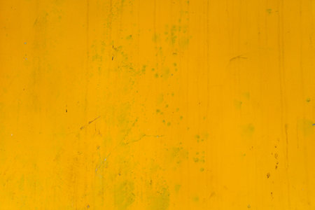 Abstract yellow cement wall texture and background. Modern grafitty wallpaper. A wall have some grunge effects and lines. Background and texture concept.の写真素材