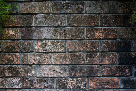Close up vintage red and brown brick wall background. Grunge background. Bric. Rustic style.の写真素材