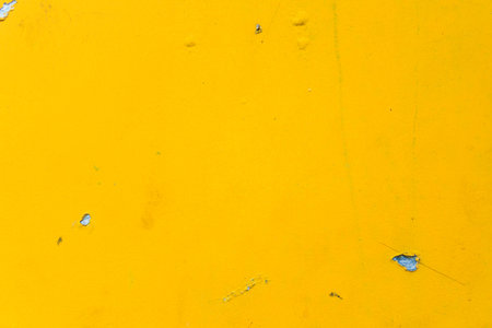 Abstract yellow cement wall texture and background. Modern grafitty wallpaper. A wall have some grunge effects and lines. Background and texture concept.の写真素材
