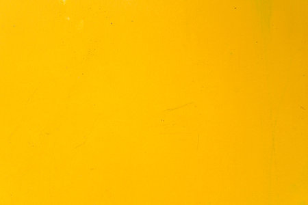 Abstract yellow cement wall texture and background. Modern grafitty wallpaper. A wall have some grunge effects and lines. Background and texture concept.の写真素材