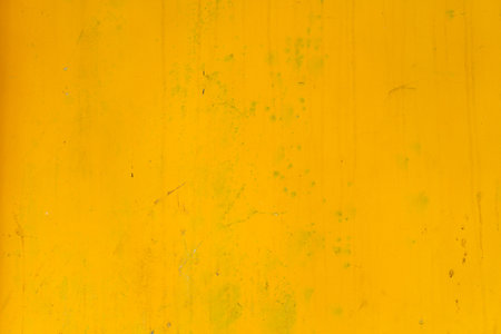 Abstract yellow cement wall texture and background. Modern grafitty wallpaper. A wall have some grunge effects and lines. Background and texture concept.の写真素材