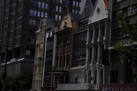 old and new building facades side by side in Adderly street, the main street of Cape Town, South Africa のeditorial素材