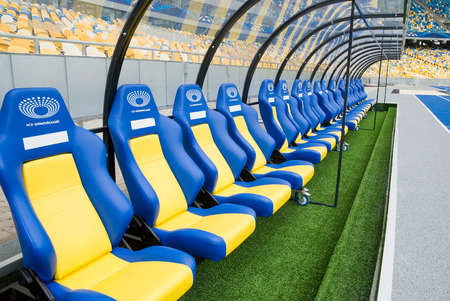 KIEV KYIV, UKRAINE - October 04, 2012: Empty coaching chairs before a football match.のeditorial素材