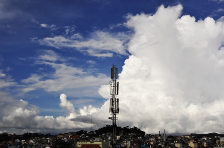 Sky with clouds and Antenna GSM in the City