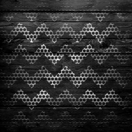 Metal chevron on wood texture background