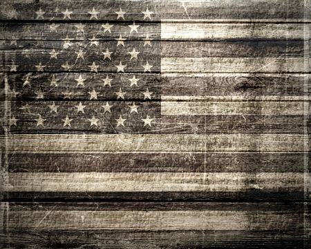 American Flag On A Wheatered Wooden Vintage Backgroundの写真素材