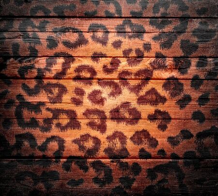 wood background overlays leopard print