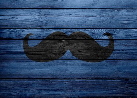 Black Mustache On Wood Texture Blueの写真素材