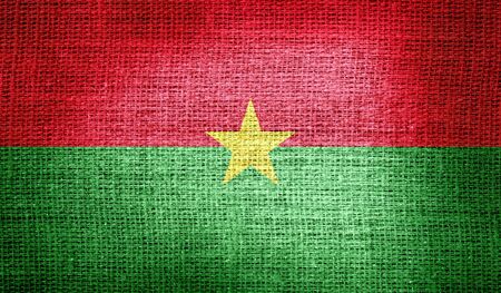 Burkina Faso flag on burlap fabricの写真素材