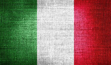Italy flag on burlap fabricの写真素材