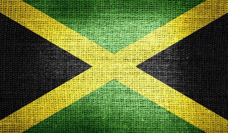 Jamaica flag on burlap fabricの写真素材