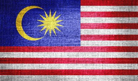 Malaysia flag on burlap fabricの写真素材