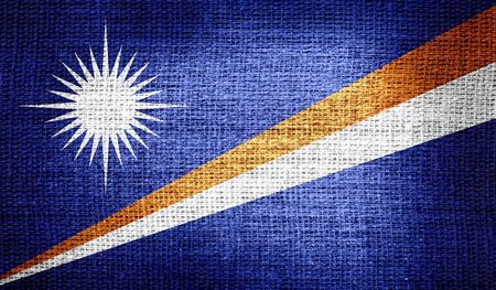 Marshall Islands flag on burlap fabricの写真素材