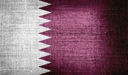 Qatar flag on burlap fabricの写真素材