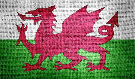 Wales flag on burlap fabricの写真素材