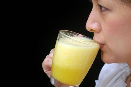 drinking orange juice