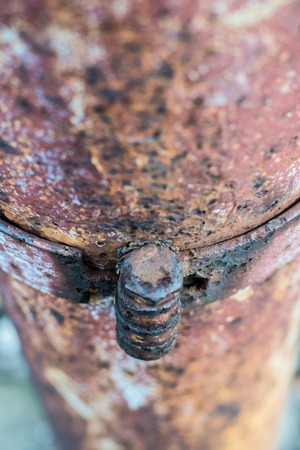 the bolts on old rustic steel columnの写真素材