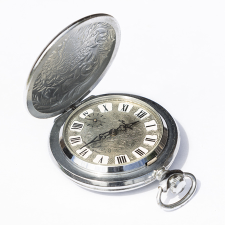 old pocket watch in expanded formの写真素材