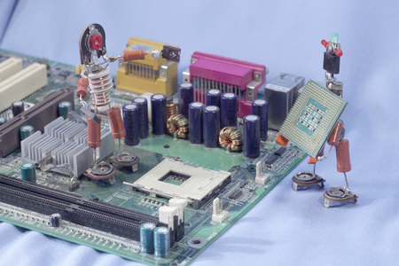 puppet men from old radio components employed computer repairの写真素材