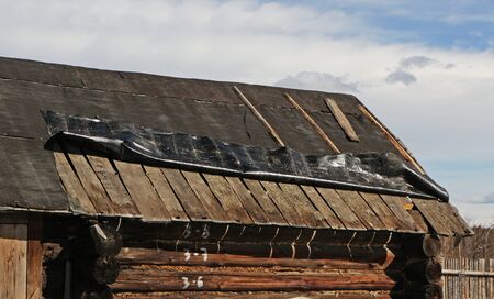 old roof needs to be repairedの写真素材