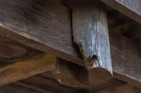 close up of joint old wood poles at wooden houseの写真素材