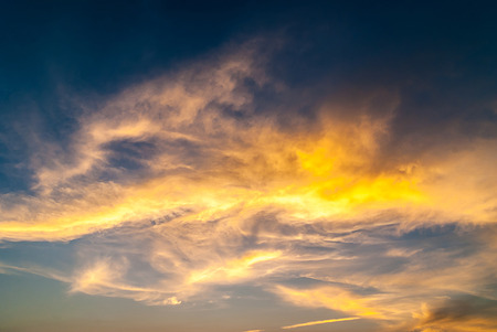 twilight sky with colorful sunset and clouds at beachの写真素材